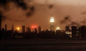 P | The Manhattan skyline remains dark after Hurricane Sandy, as seen from Williamsburg in Brooklyn.